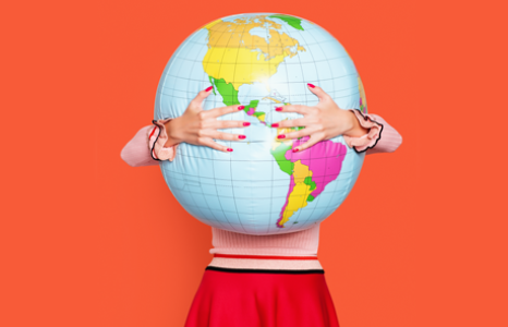Person Hugging an Inflatable Globe