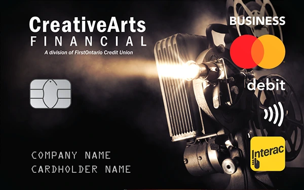 Creative Arts Financial Business debit card featuring a classic film projector design, with Mastercard and Interac logos, contactless payment symbol, and placeholders for company and cardholder names.