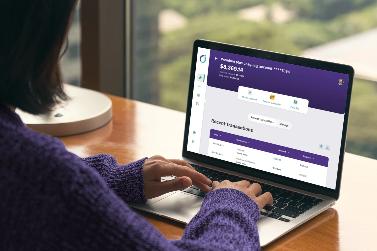 Person using Creative Arts Financial's new online banking experience on laptop.