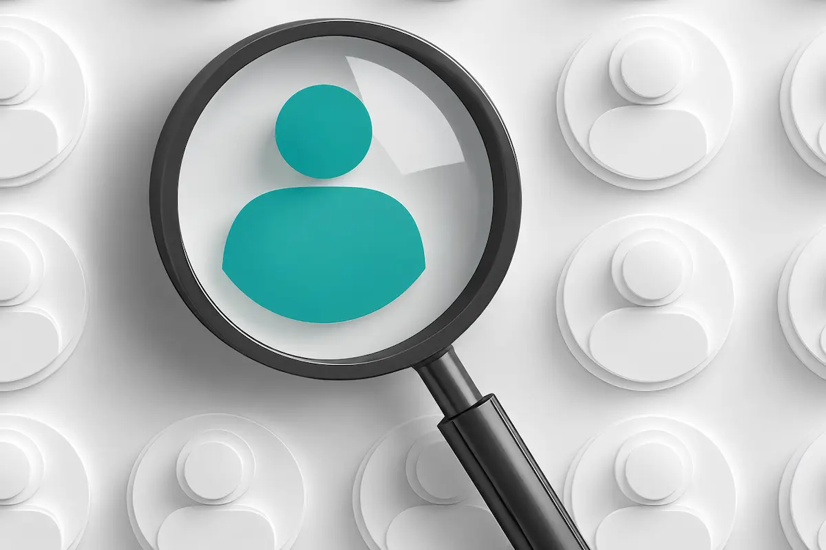 Learn about FirstOntario’s Board of Directors Elections. Magnifying glass highlighting an icon representing a candidate among a group of people.
